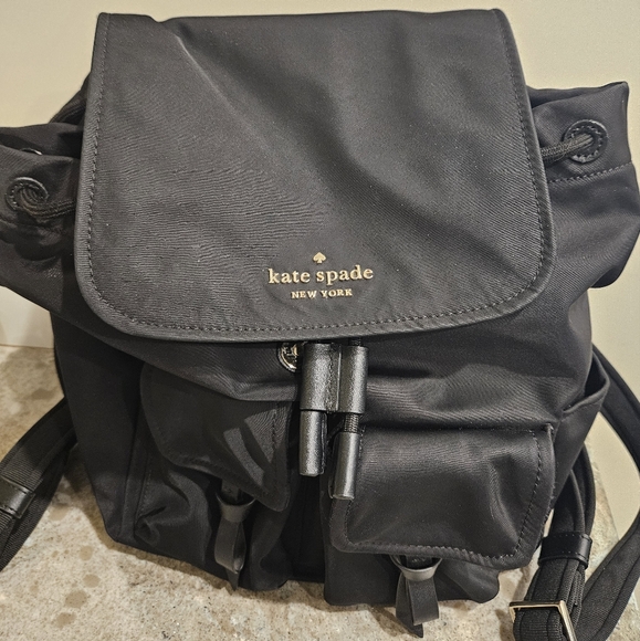 Kate Spade Black Carley Flap Nylon Drawstring Backpack w / Pockets - Picture 2 of 10